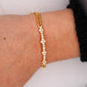 0.88 Carat Diamond in 18K Gold Twisted Rope Chain Floral Bracelet