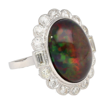 Bague cocktail en opale noire de 10,08 carats avec halo de diamants baguette et ronds – Assay Jewelers