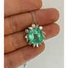 11.54 carat Colombian Emerald and Baguette Diamond Pendant in Platinum