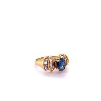 1.19 Carat Oval Cut Blue Sapphire with Baguette Cut Diamonds in 14k Gold Ring – Assay Jewelers