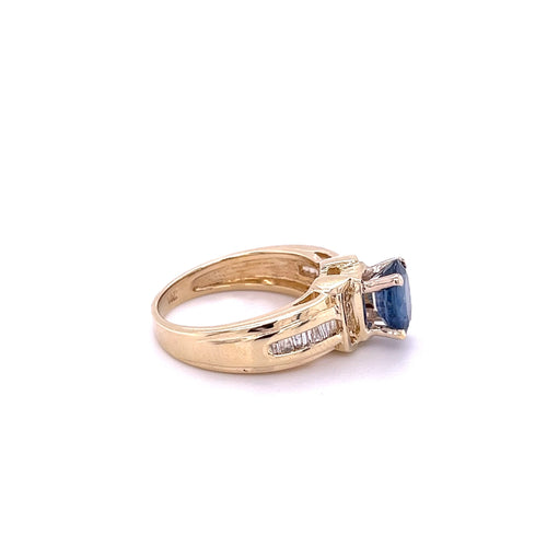 1.22 Carat Oval Cut Blue Sapphire with Baguette Cut Diamonds in 14k Gold Ring