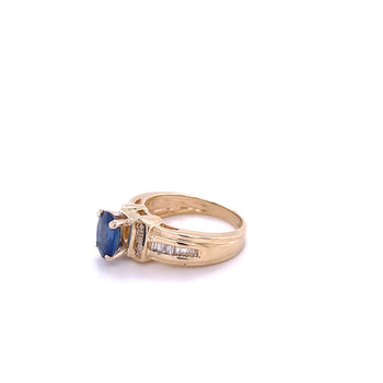 1.22 Carat Oval Cut Blue Sapphire with Baguette Cut Diamonds in 14k Gold Ring – Assay Jewelers