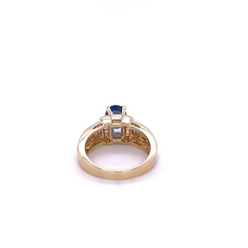 1.22 Carat Oval Cut Blue Sapphire with Baguette Cut Diamonds in 14k Gold Ring – Assay Jewelers