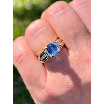 1.22 Carat Oval Cut Blue Sapphire with Baguette Cut Diamonds in 14k Gold Ring – Assay Jewelers