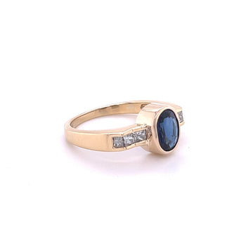 1.48 Carat Oval Cut Blue Sapphire With Princess Cut Diamond Ring in 18k Gold – Assay Jewelers