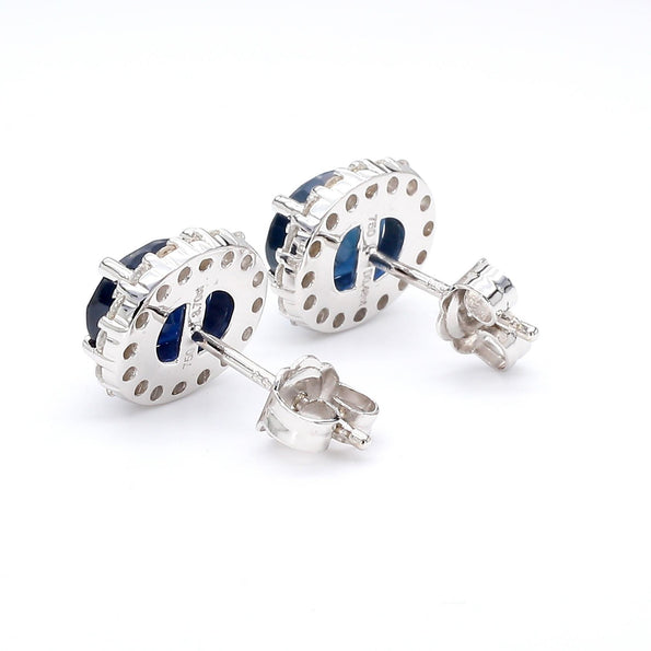 3.70 Carat Oval Dark Blue Sapphire & 0.48 Carat Diamond Halo 18K White Gold Stud