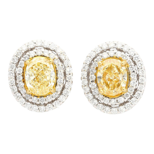 3.73 Carat TW Oval Cut Fancy Yellow Diamond Double Halo Stud Earrings
