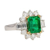 4.42 Carat TW Colombian Emerald with Round & Emerald Cut Diamond Halo Ring