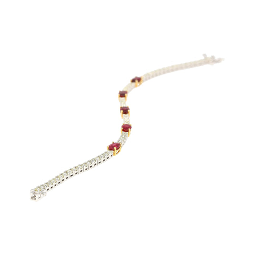 5.54 Carat Oval Cut Ruby and Diamond Tennis Bracelet in Two Tone 18K Gold