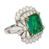 6.26 Carat Emerald Cut Emerald with Trillion and Round Cut Diamond Side Stone Ring in 18K White, Yellow Gold