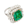 6.26 Carat Emerald Cut Emerald with Trillion and Round Cut Diamond Side Stone Ring in 18K White, Yellow Gold