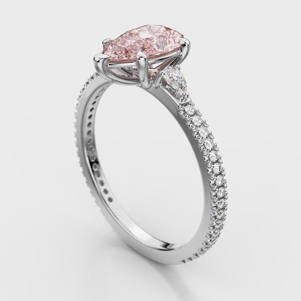 GIA Certified 1.10 Carat Fancy Light Pink Diamond Three Stone Ring