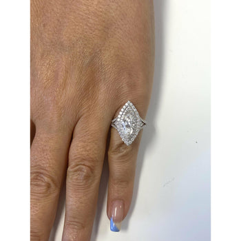 GIA Certified 2.38 Carat Marquis-Cut, H Color, Si1 Clarity Diamond set in 18k white gold and diamond halo ring – Assay Jewelers