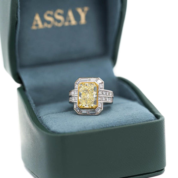 GIA Certified 4.12 Carat Fancy Yellow VS1 Radiant Diamond Halo Engagement Ring
