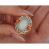 GIA Zertifiziert 8 Karat Weißer Opal mit Orange Granat & Aquamarin Halo Ring