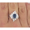 Natural 1.52 Carat Oval Blue Sapphire and Diamond Platinum Floral Ring