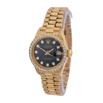 Montre Rolex Datejust 6917 26 mm en or 18K, bracelet President, lunette diamantée, cadran noir – Assay Jewelers