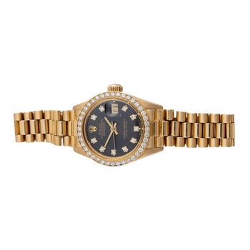 Montre Rolex Datejust 6917 26 mm en or 18K, bracelet President, lunette diamantée, cadran noir – Assay Jewelers