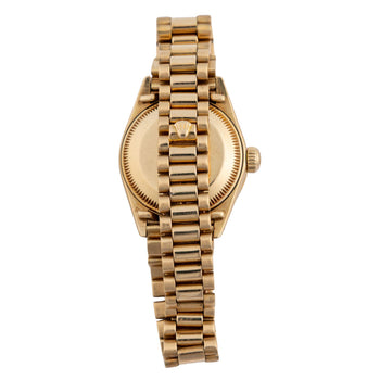 Montre Rolex Datejust 6917 26 mm en or 18K, bracelet President, lunette diamantée, cadran noir – Assay Jewelers