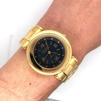 Montre automatique Van Cleef & Arpels en or 18K, cadran noir 37 mm, bracelet en or – Assay Jewelers
