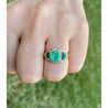 Vintage 3 stone oval cut Colombian Emerald Ring in 18k Yellow Gold