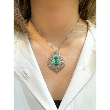 Vintage Art Nouveau Style Carved 18K White Gold Pendant Necklace With Shield Cut Emerald and Diamond Side Stones – Assay Jewelers