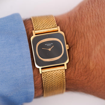 Vintage Patek Philippe 25mm Square Ellipse 18K Gold Black Dial Watch – Assay Jewelers