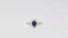 1.16 Carat Oval Blue Sapphire and Diamond Textured Halo Platinum Ring