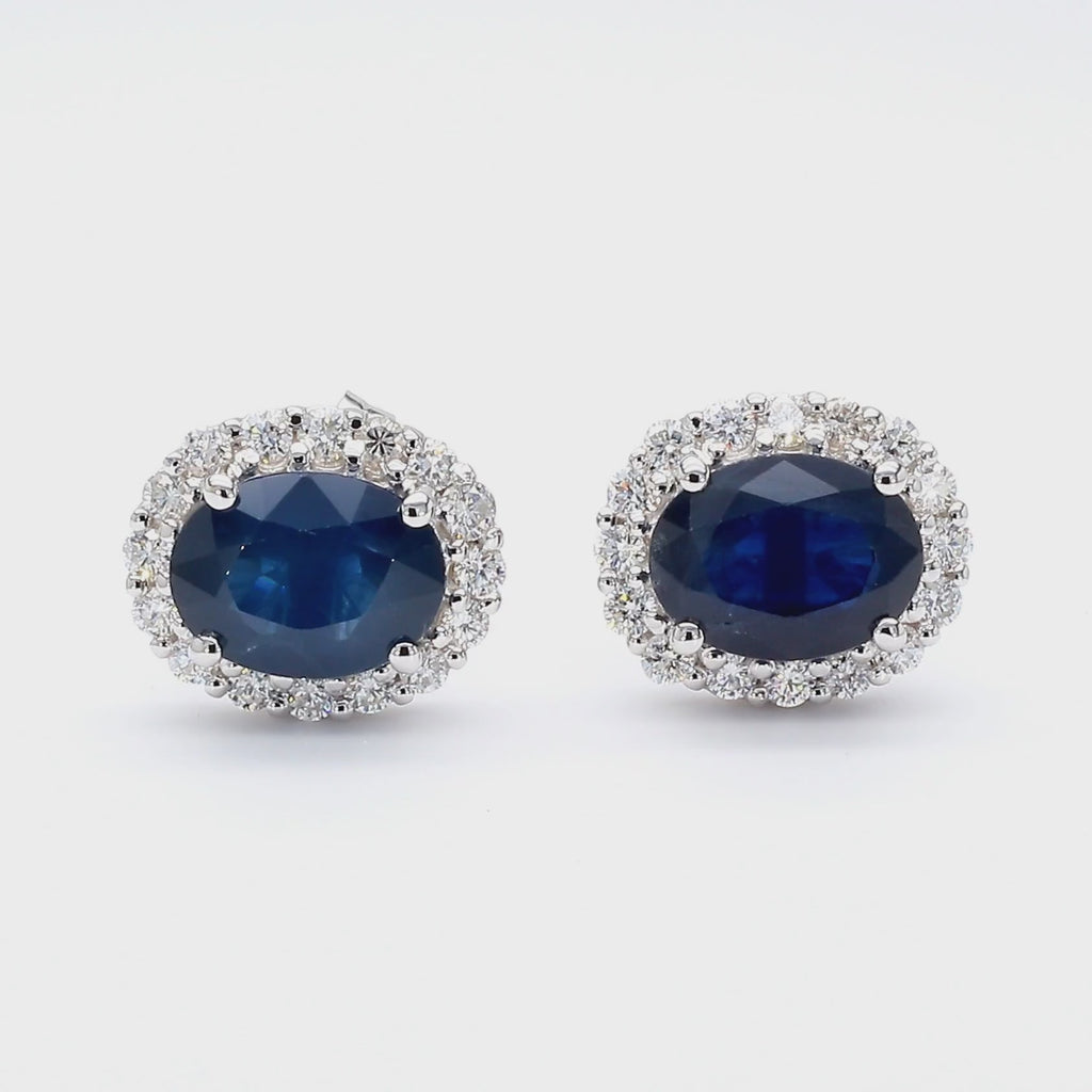 3.70 Carat Oval Dark Blue Sapphire & 0.48 Carat Diamond Halo 18K White Gold Stud